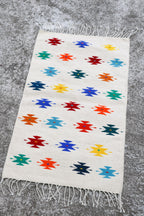 Alfombra de lana oaxaqueña geométrica colorida